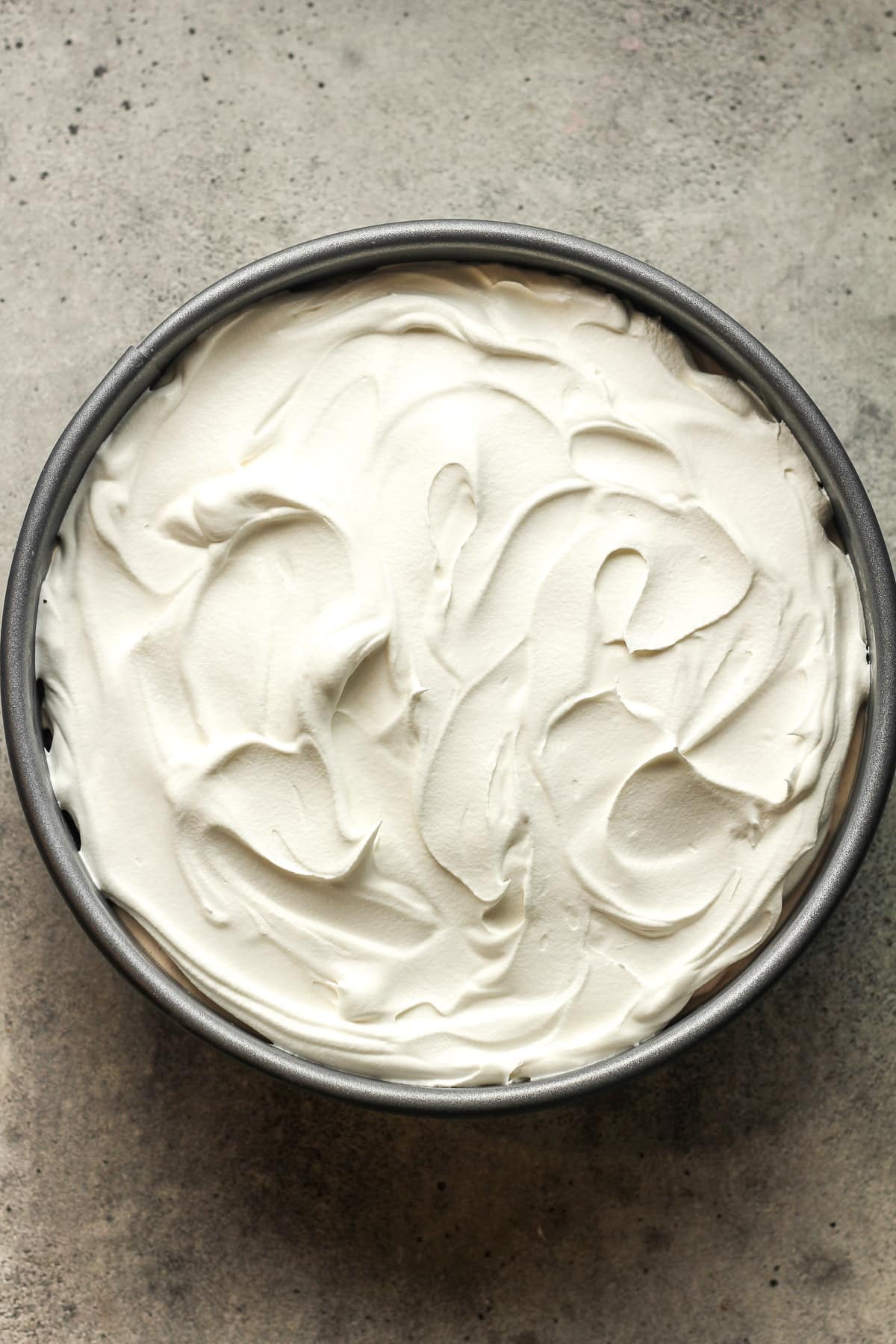 The whipped topping layer on top.