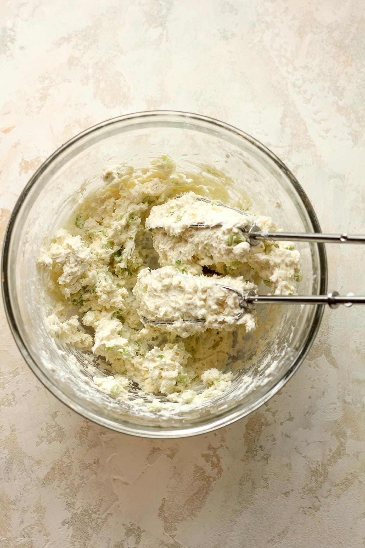 A bowl of the combined cream cheese and blue cheese filling.