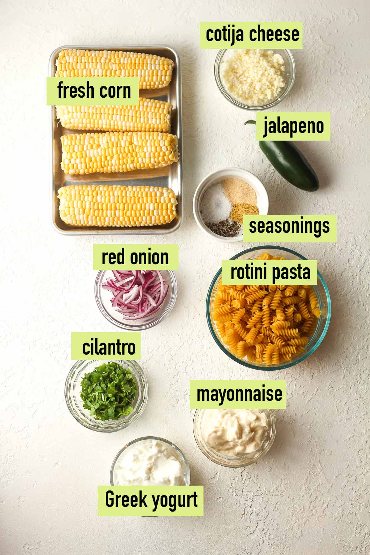 Labeled ingredients for Mexican street corn salad recipe.