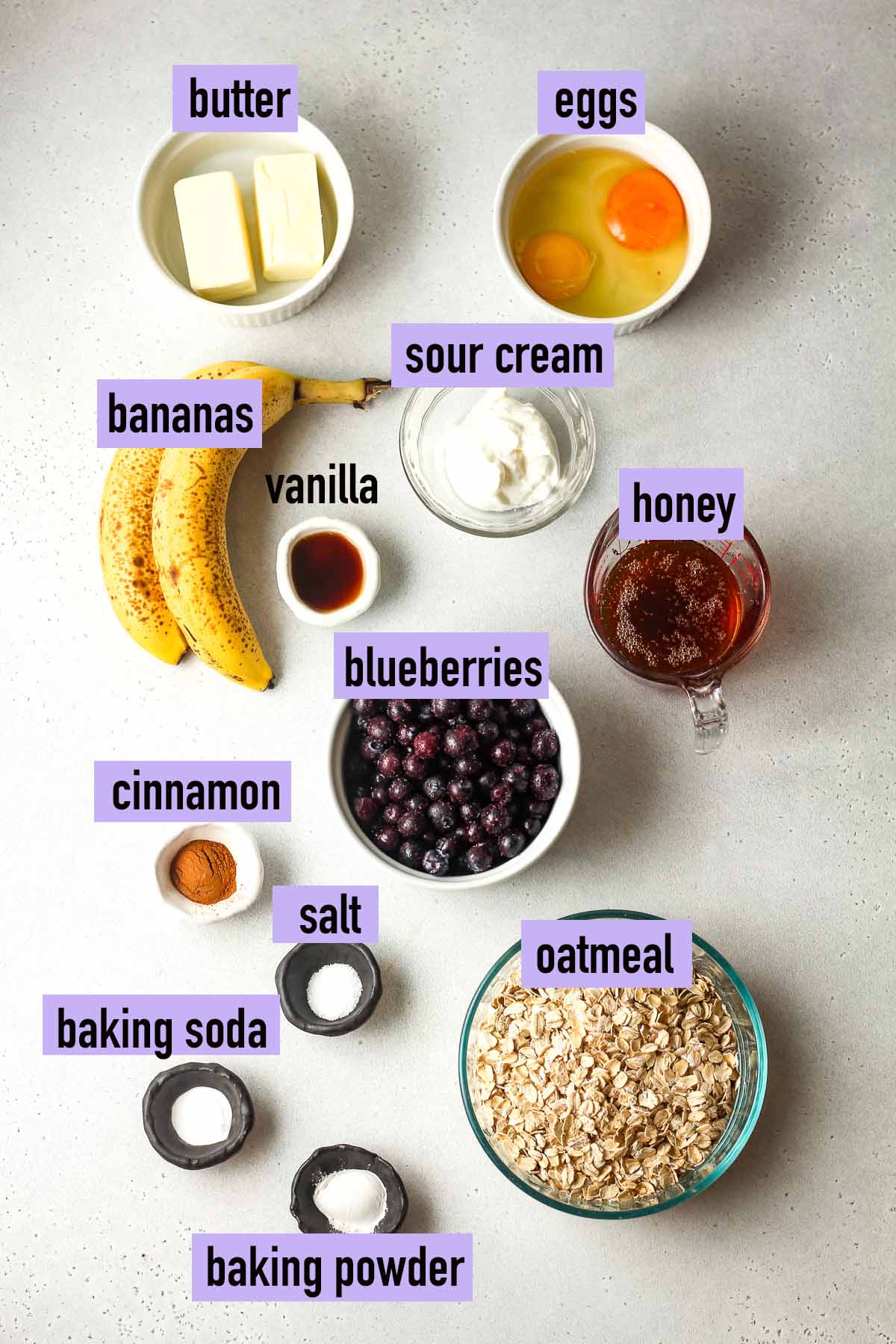 Labeled ingredients for blueberry banana oatmeal muffins.