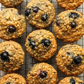 Closeup on some blueberry banana oatmeal muffins.