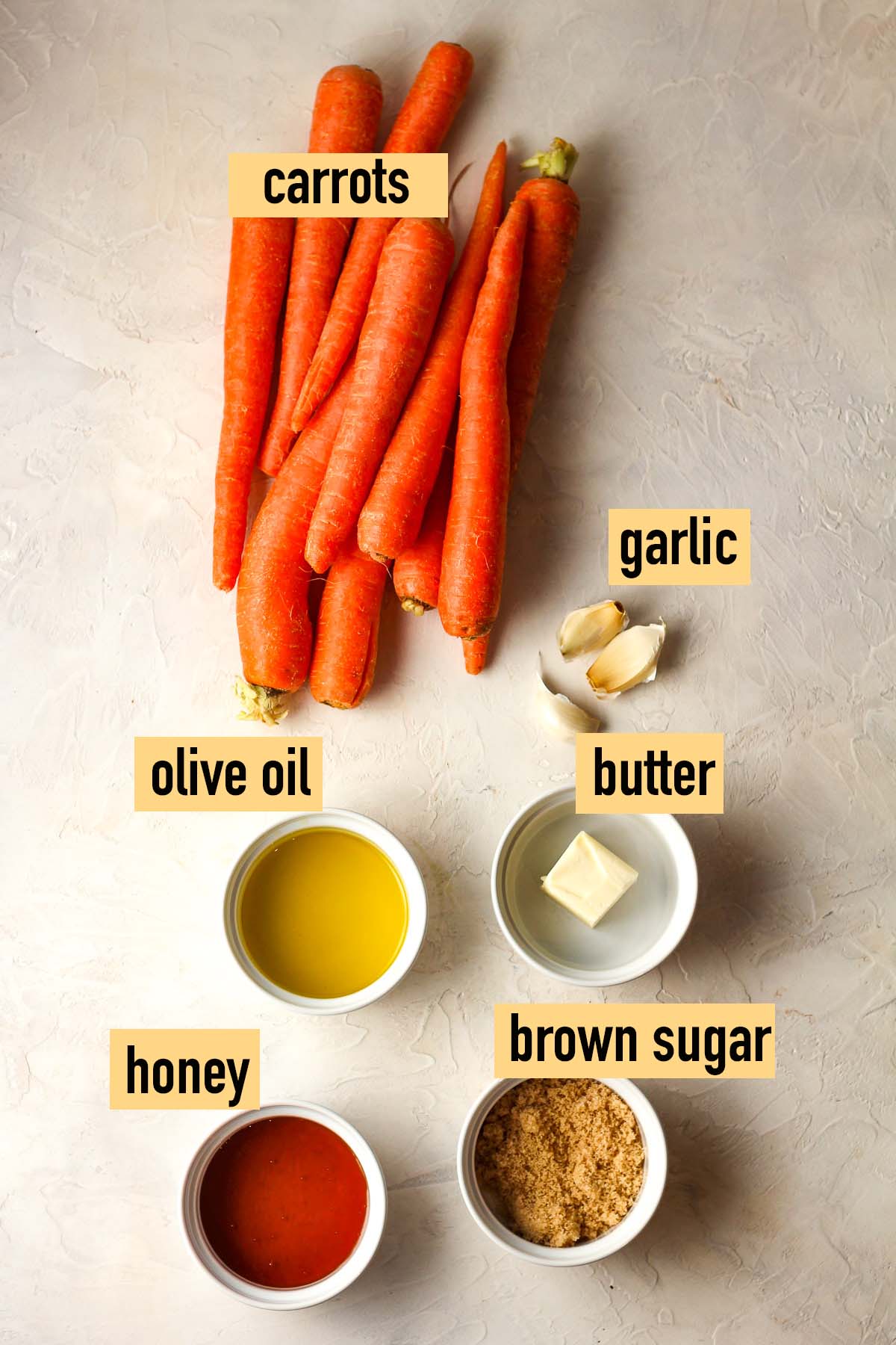 Labeled ingredients for brown sugar honey roasted carrots.