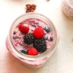 A jar of frozen berry overnight oatmeal.