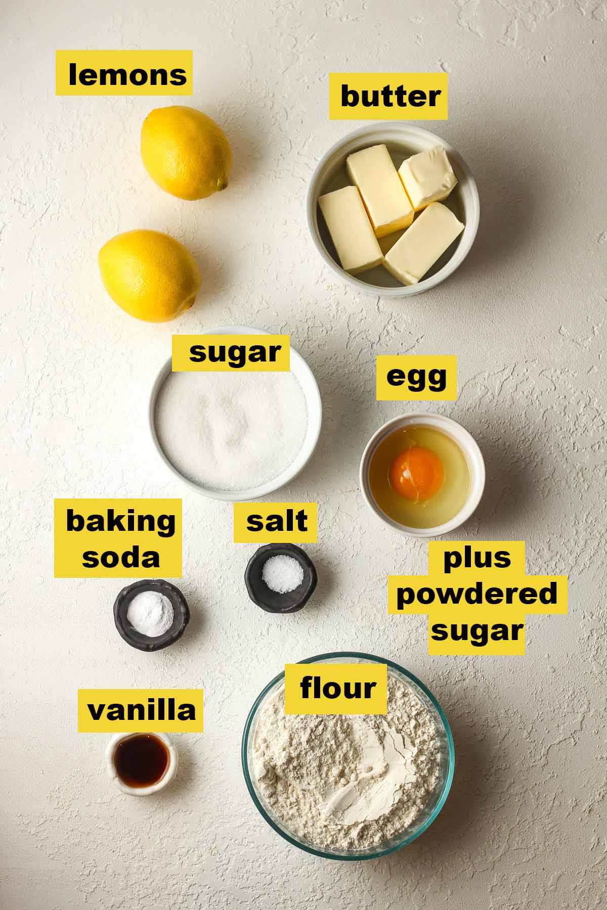 Labeled ingredients for glazed lemon sugar cookies.