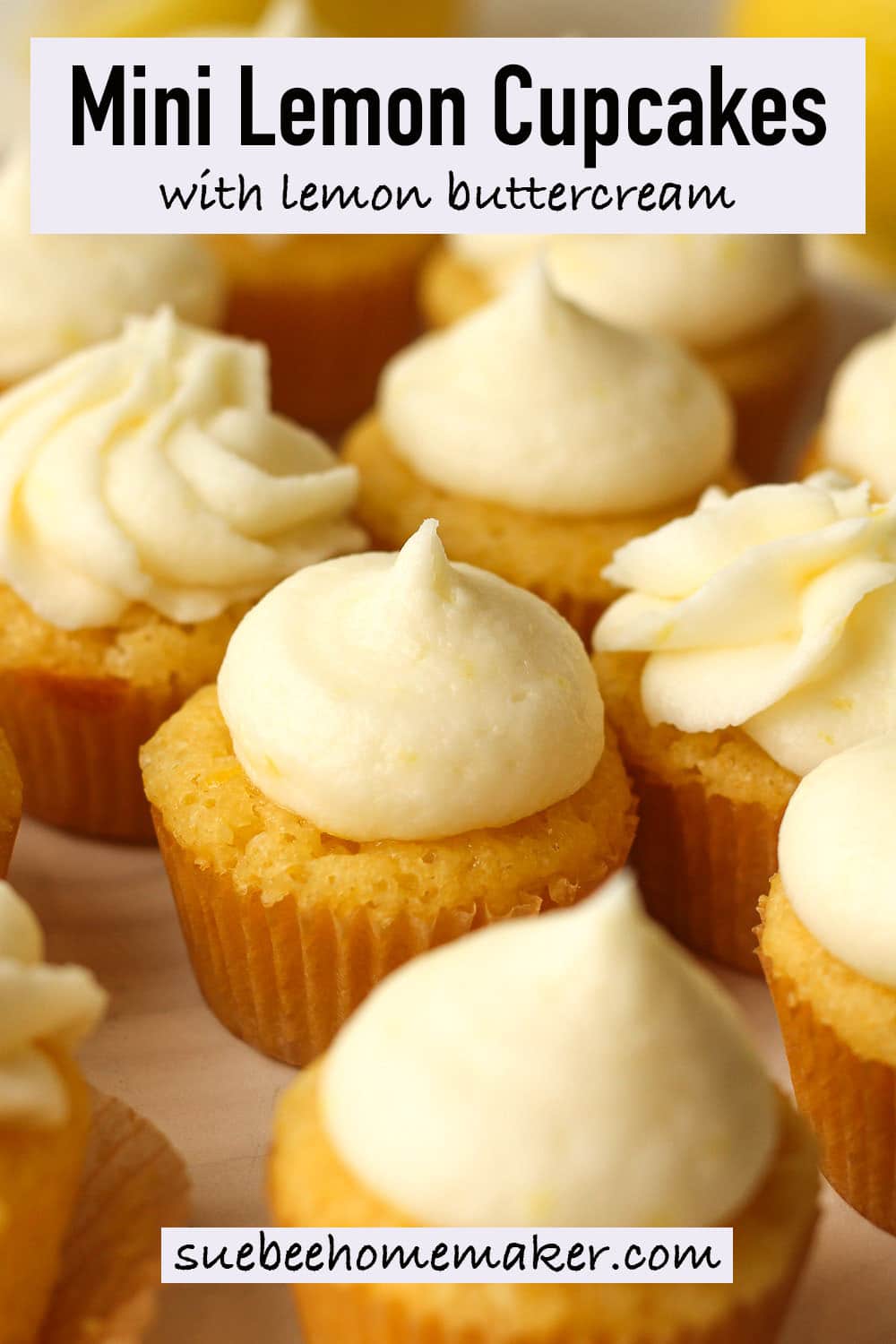 Side view of a plate of mini lemon cupcakes with lemon buttercream.