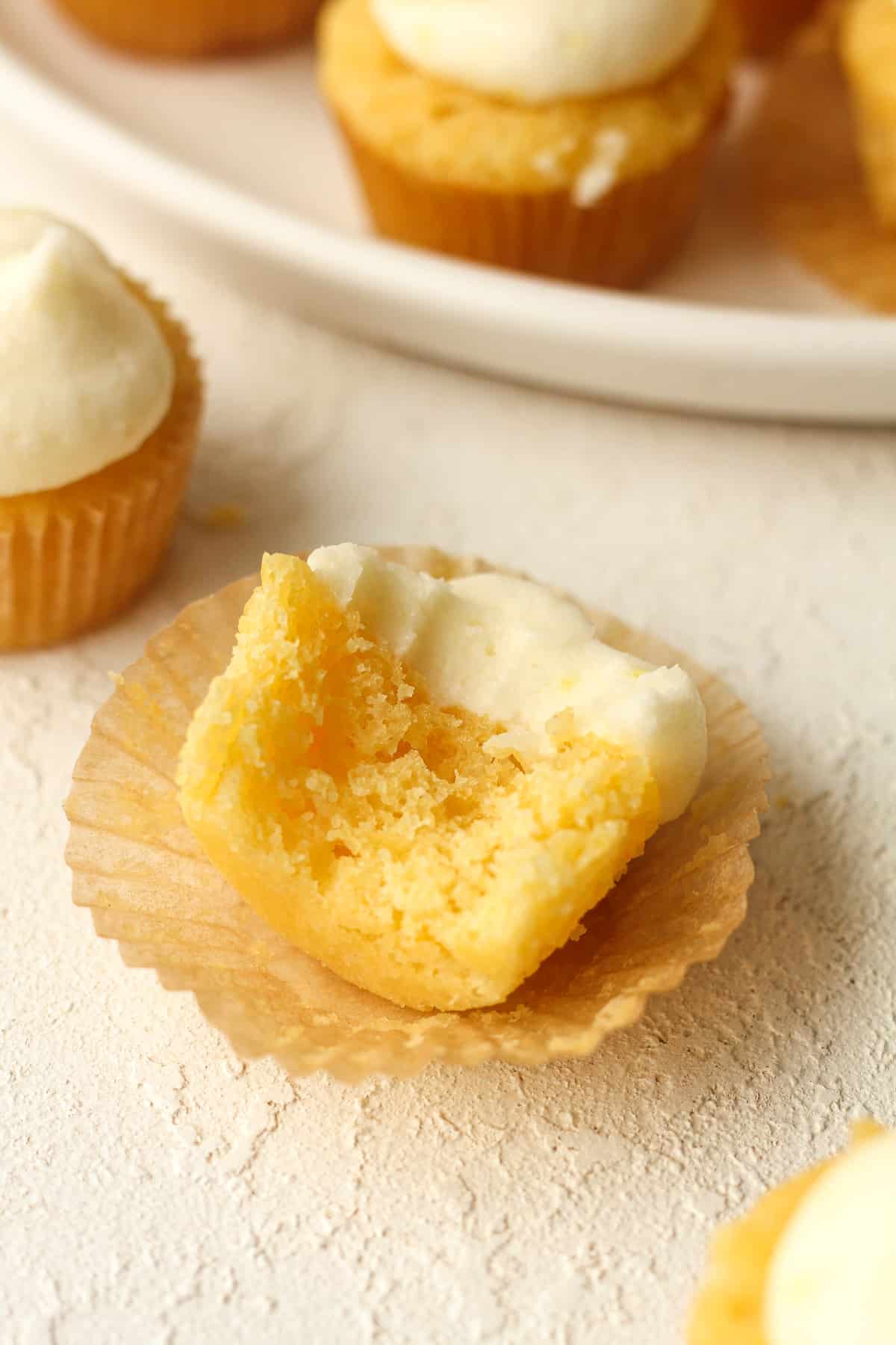 Overhead view of a mini cupcake with a bite out of it.