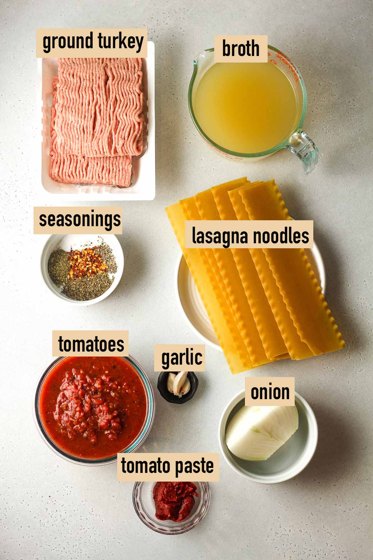 Labeled ingredients for turkey lasagna soup.