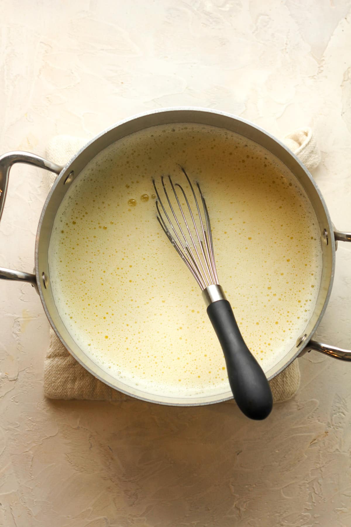 A pan of the tempered egg mixture.