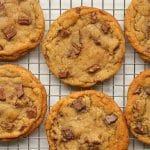 Brown butter toffee cookies on a cooling rack.