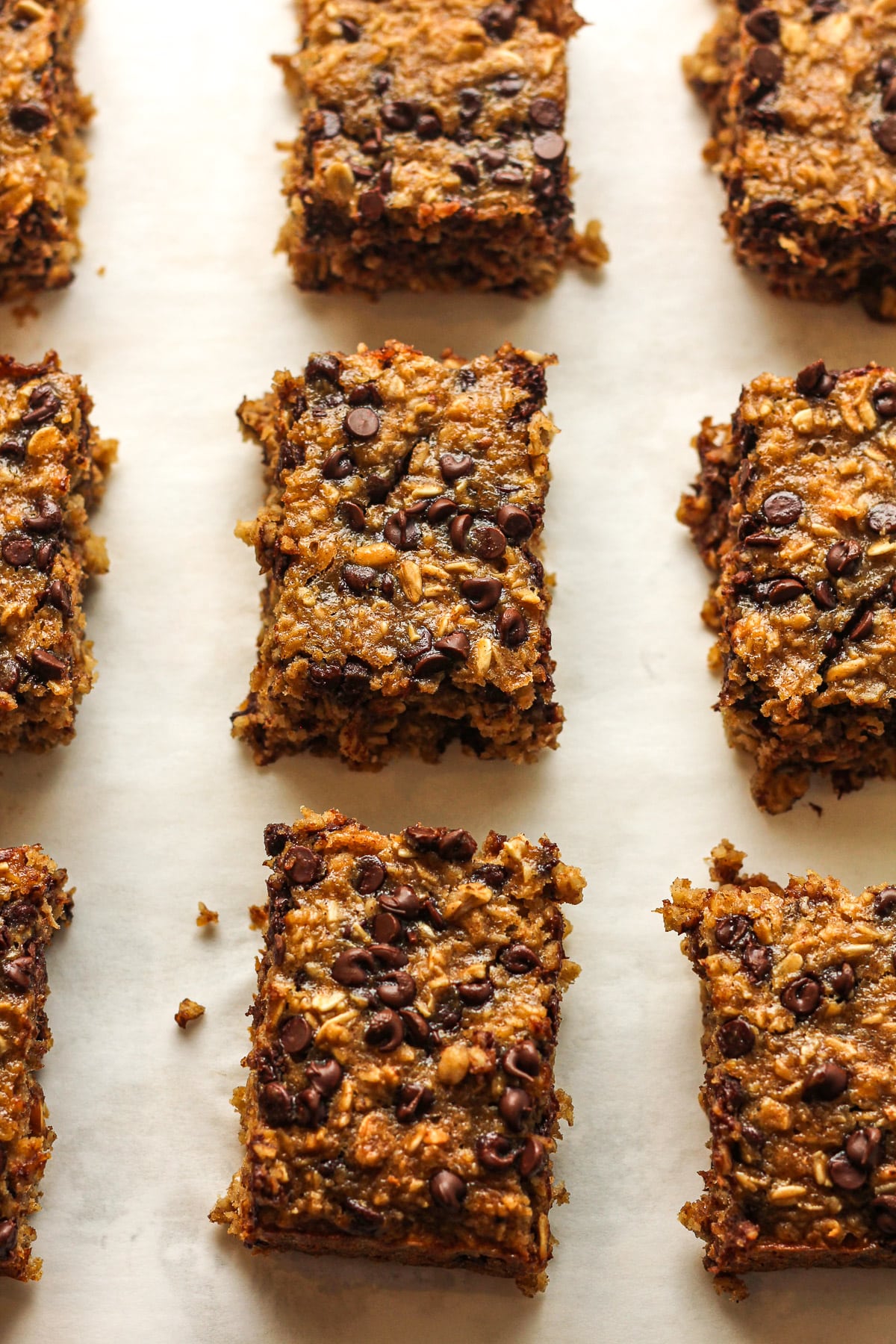 Overhead view of sliced healthy oat bars with mini chocolate chips.