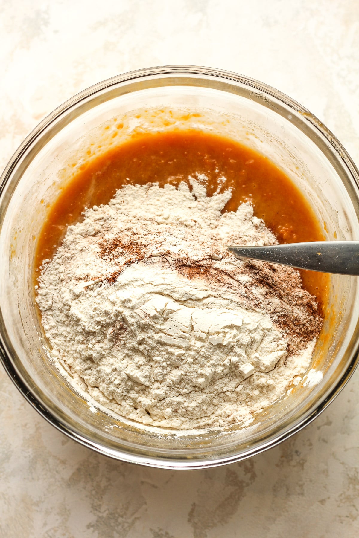 A bowl of the wet ingredients plus the dry on top.