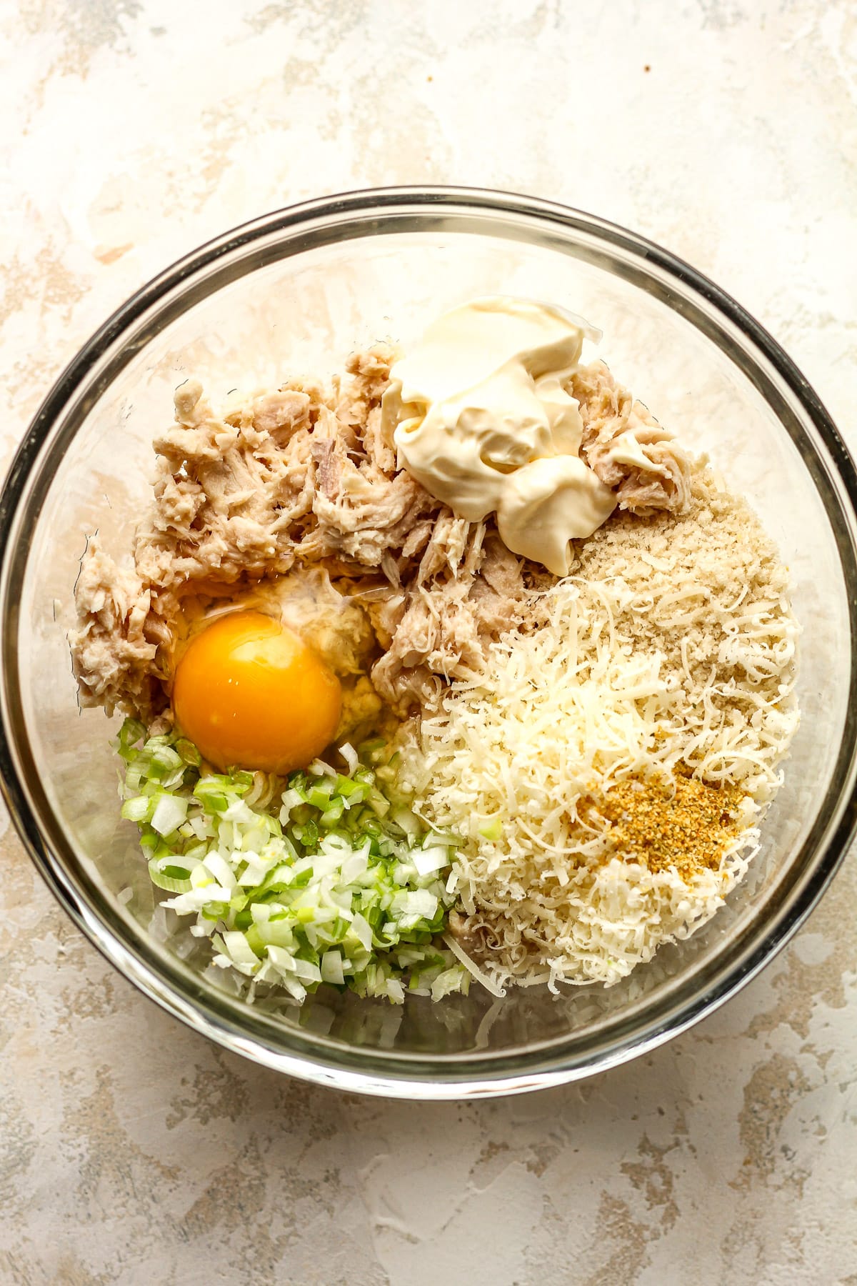 A bowl of the tuna patty ingredients before mixing together.