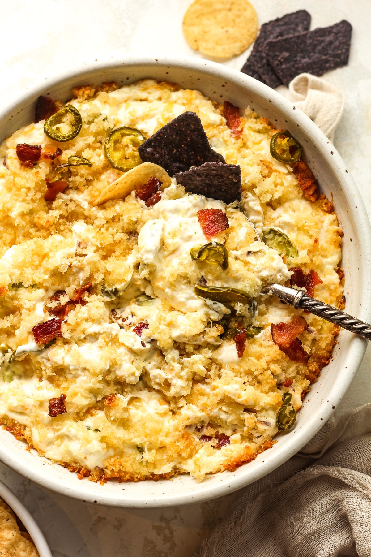 A bowl of the jalapeño popper dip with chips.