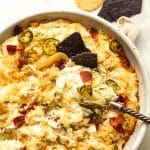Closeup on a bowl of jalapeño popper dip.