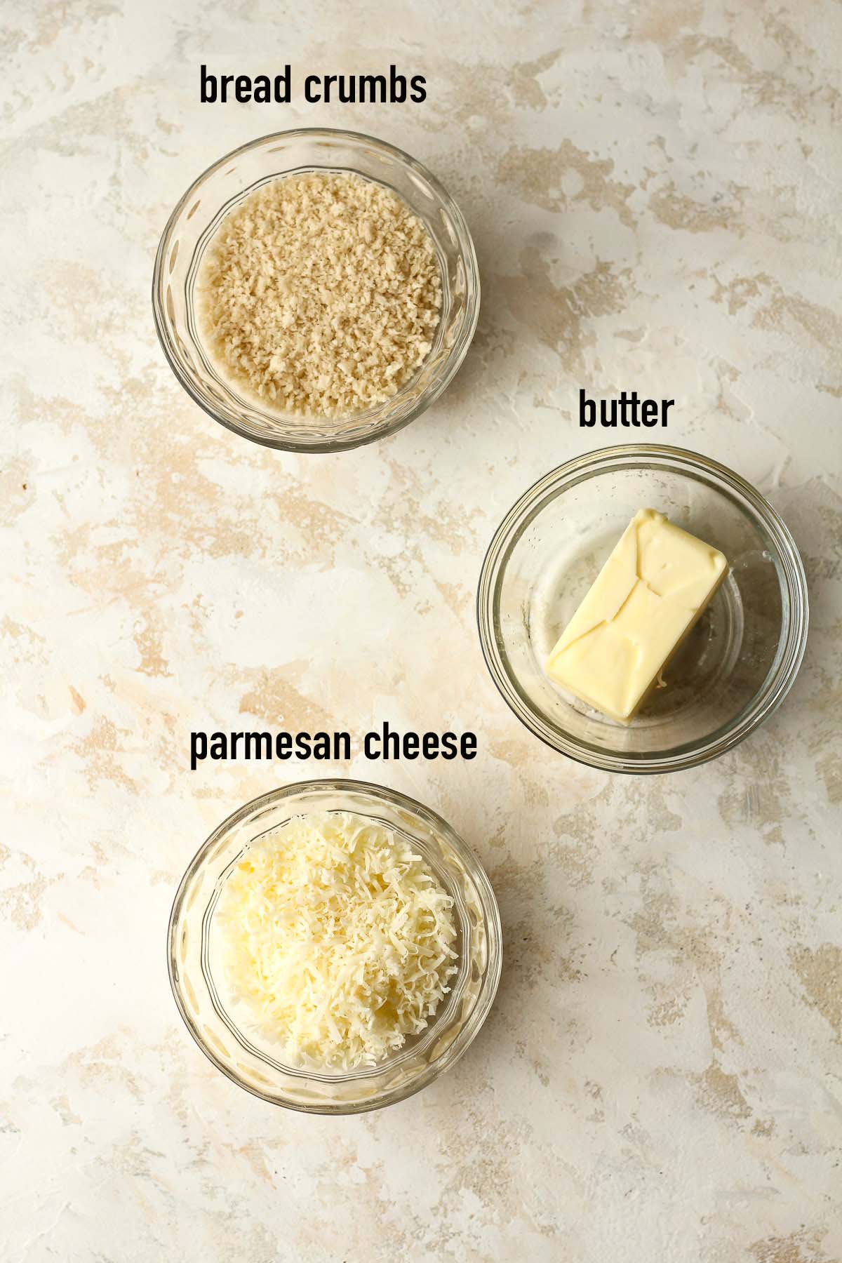 The labeled topping ingredients in small bowls.