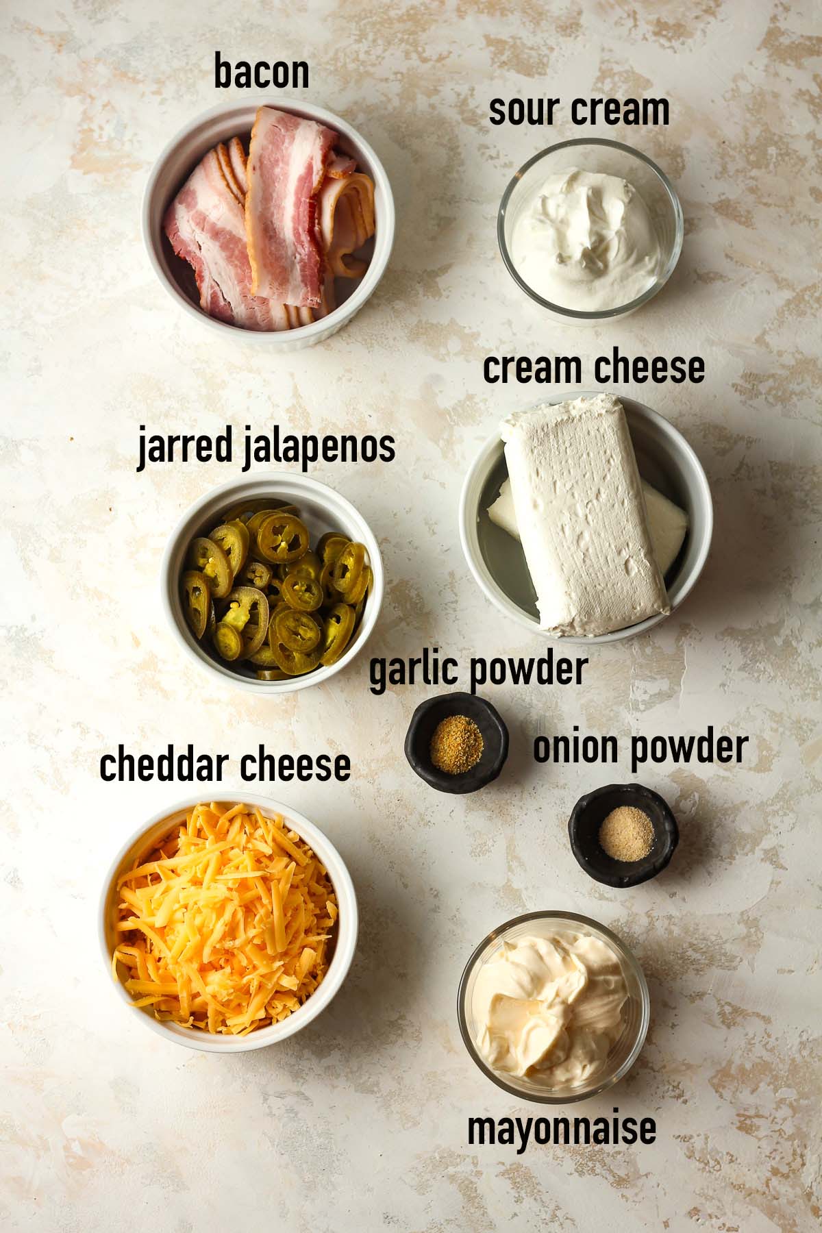 The labeled dip ingredients in small bowls.