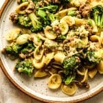 Closeup on the sausage and broccoli pasta on a plate.