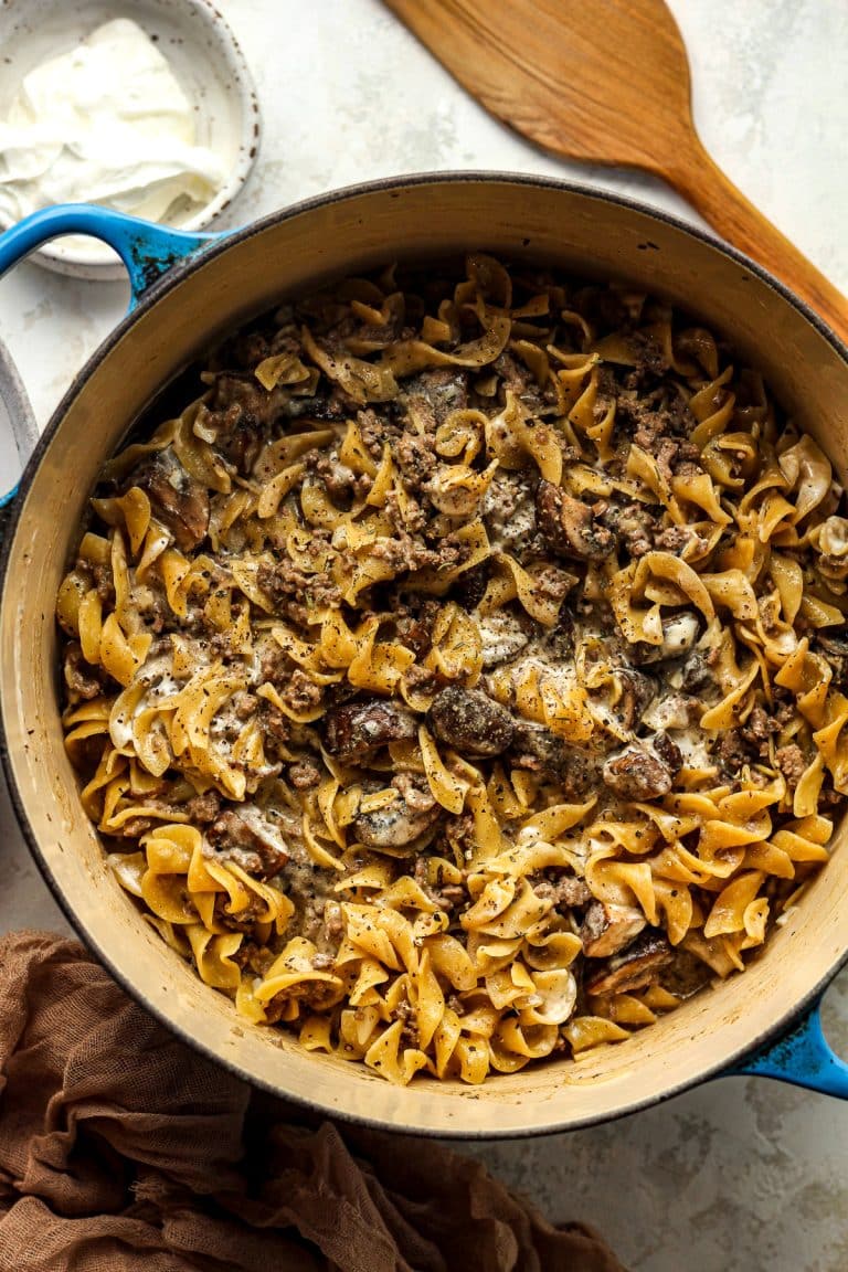 A pot of homemade beef stroganoff with mushrooms.