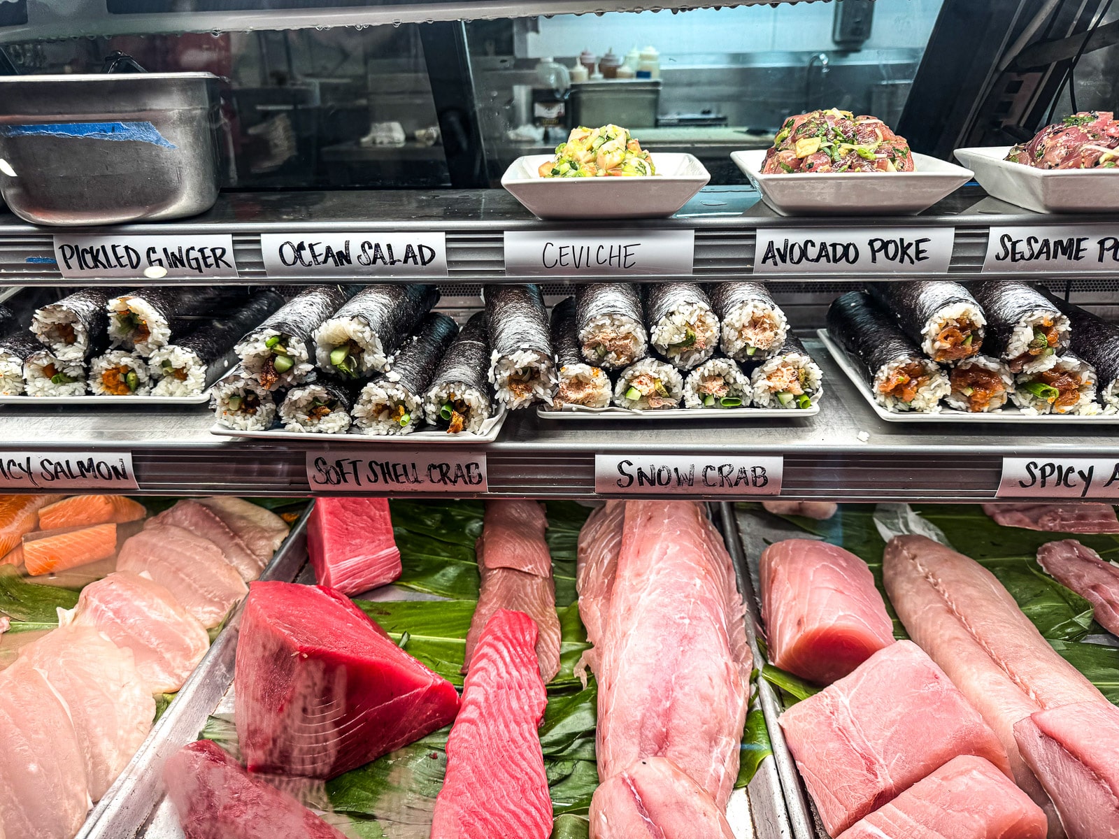 The dolphin fish market showing fish and sushi.