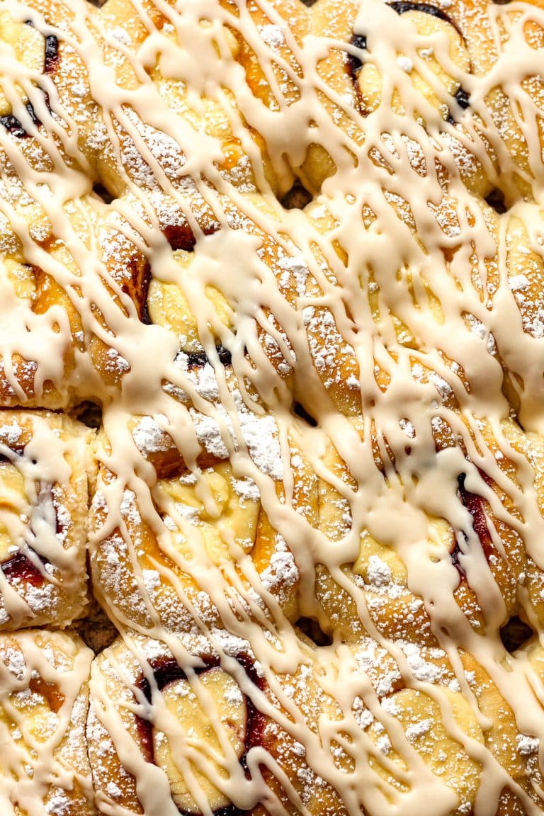 Closeup on some fruit and cream cheese kolaches.