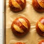 Closeup on some just baked pretzel buns.