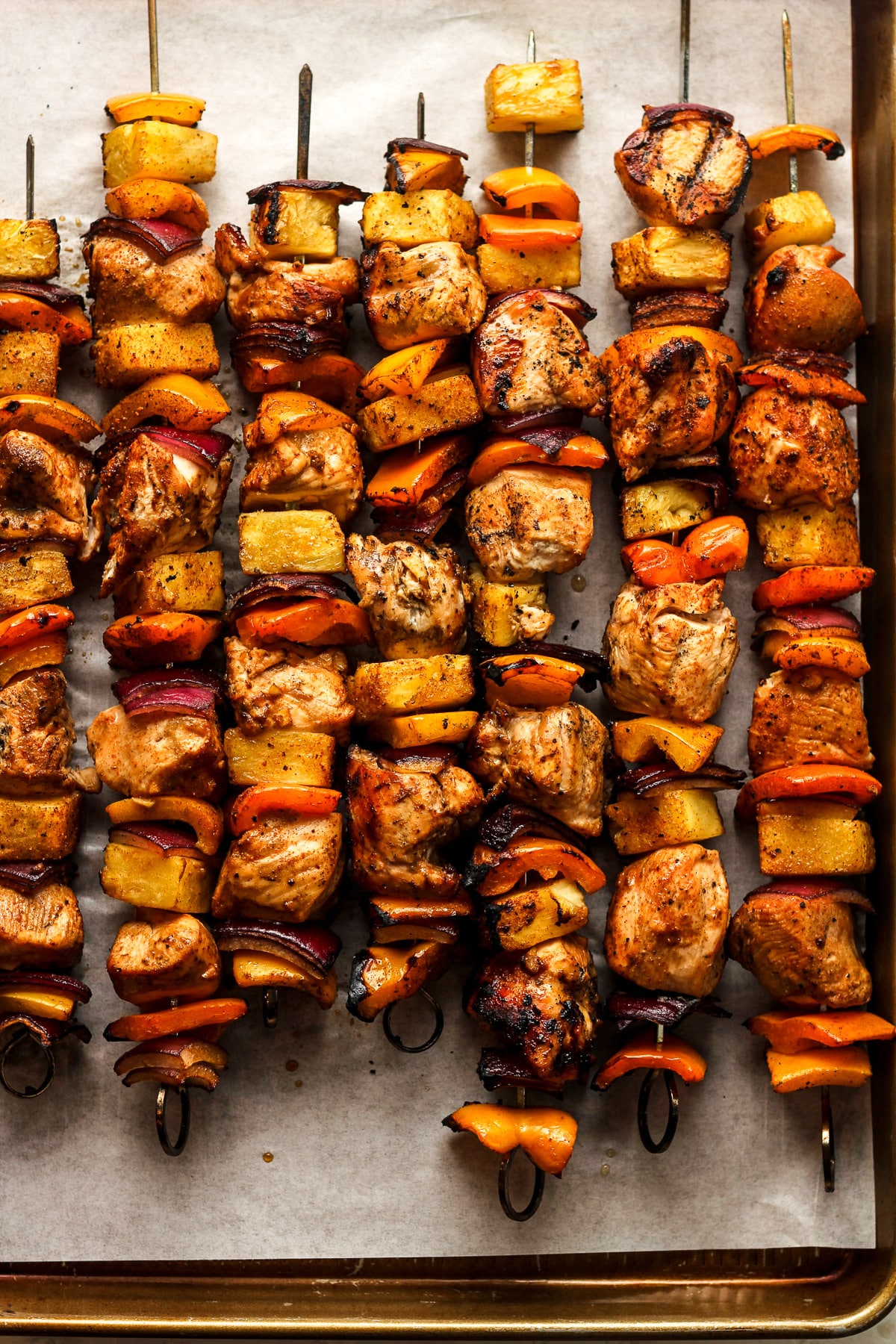 A sheet pan of the grilled kabobs.