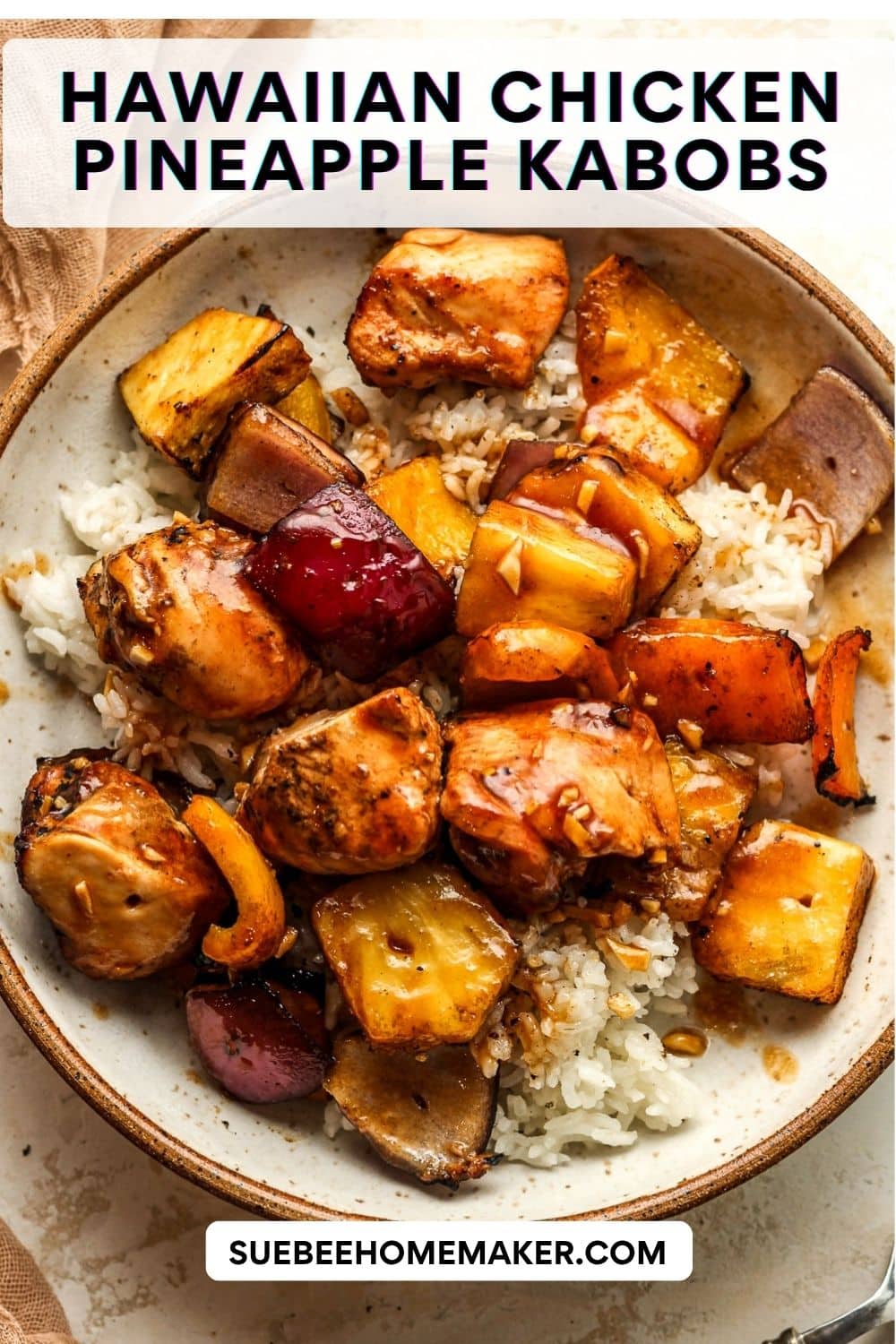 A Hawaiian chicken pineapple kabob bowl over rice and a sweet and savory marinade.
