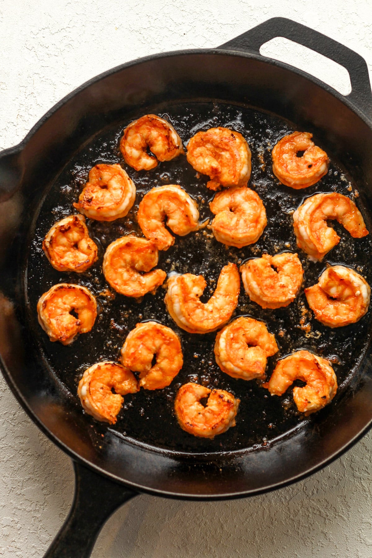 A skillet of sriracha shrimp - after cooking.