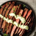 A plate of thinly sliced grilled carne asada.