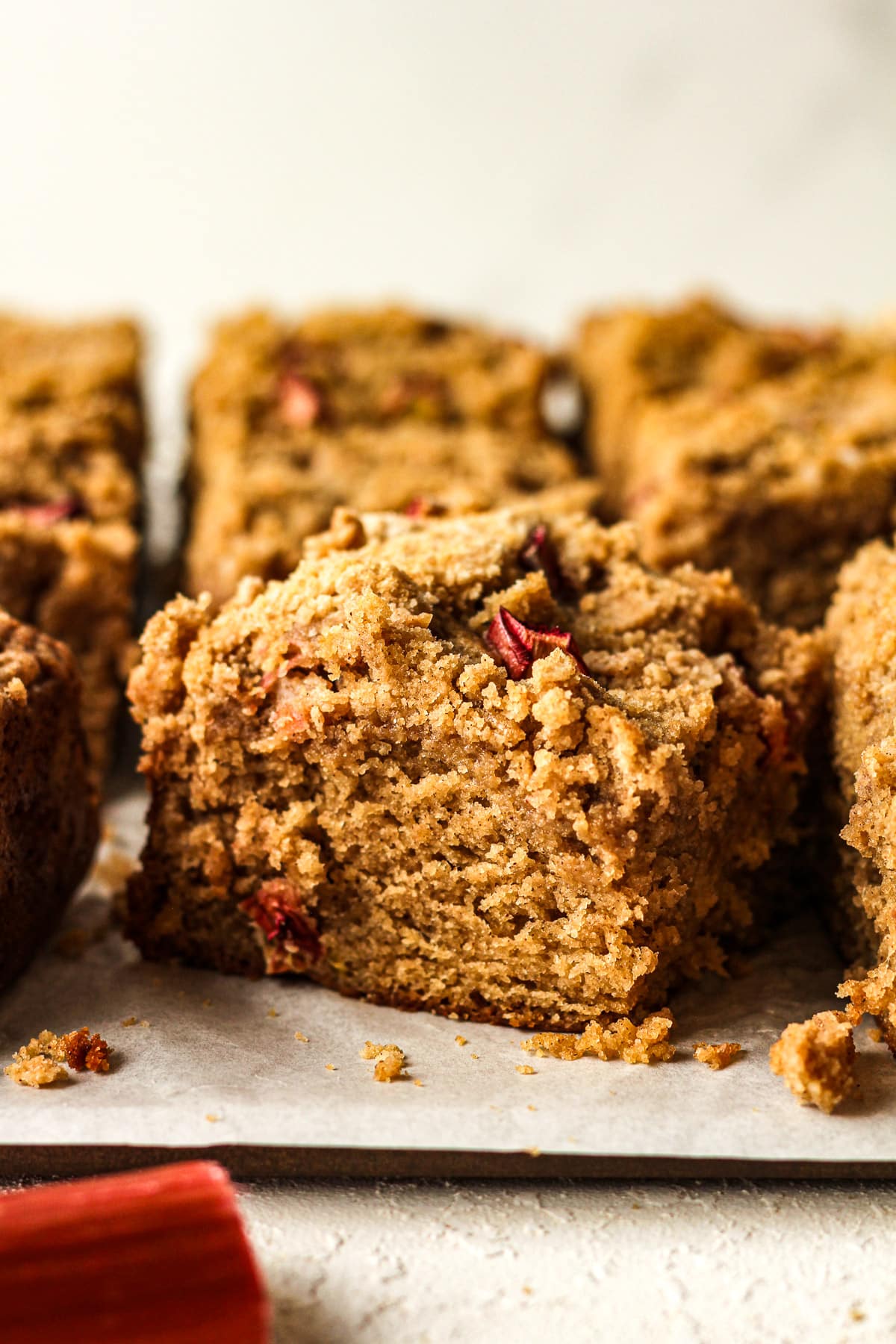 Side view of sliced pieces of rhubarb streusel cake.