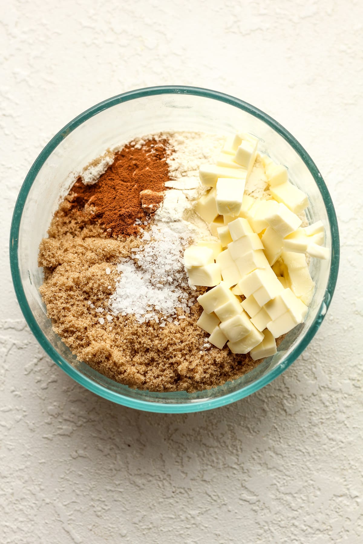 A round bowl of the streusel ingredients.