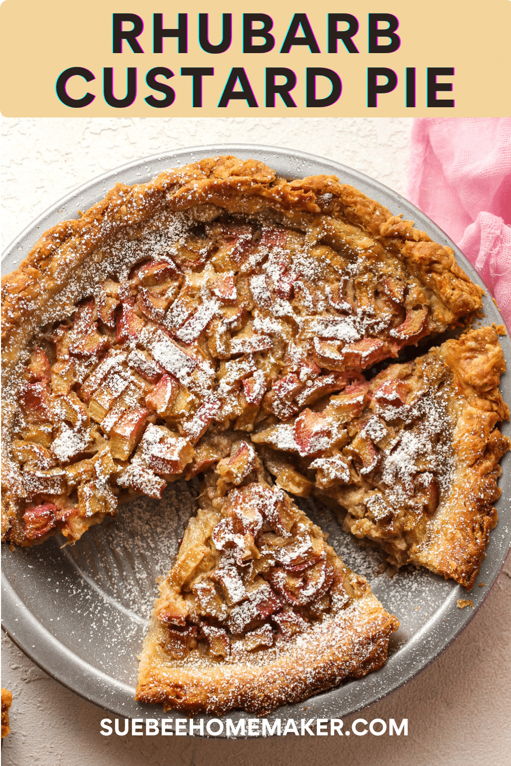 Overhead view of a rhubarb custard pie with some of the pie removed.