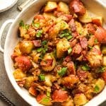 Closeup on a bowl of German potato salad with bacon.