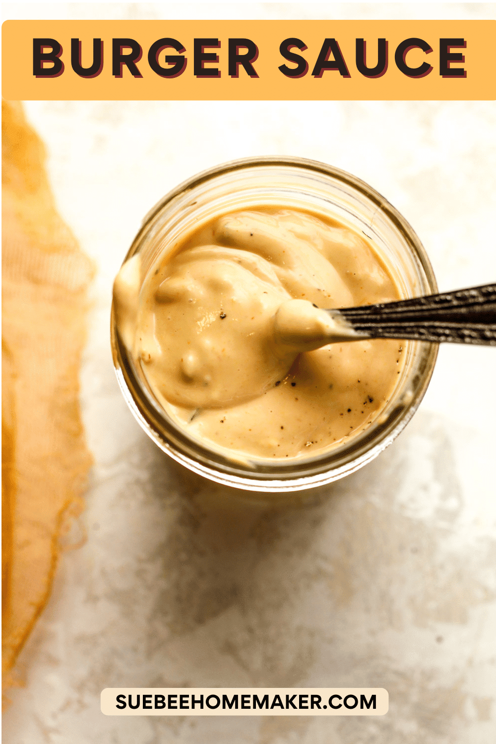 Overhead view of a jar of burger sauce.