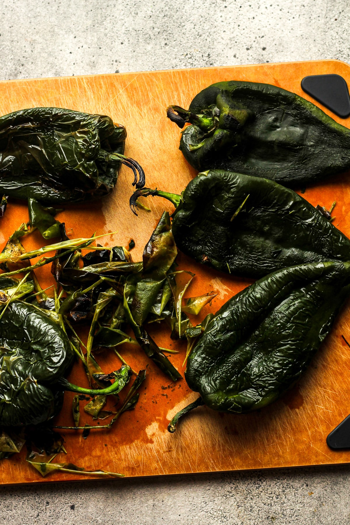 The poblano peppers after roasting showing the skins.