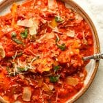 Closeup on a serving plate of ravioli alla vodka.