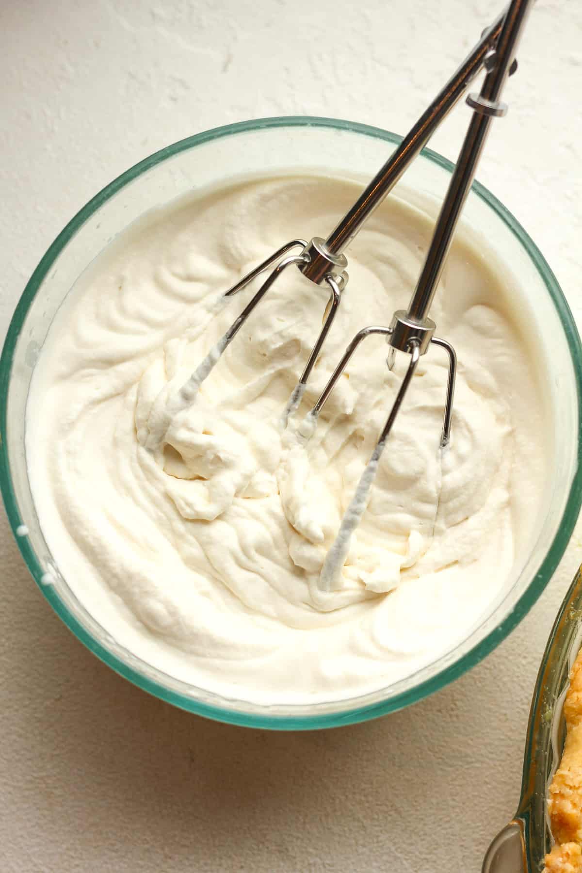 A bowl of the whipped cream.