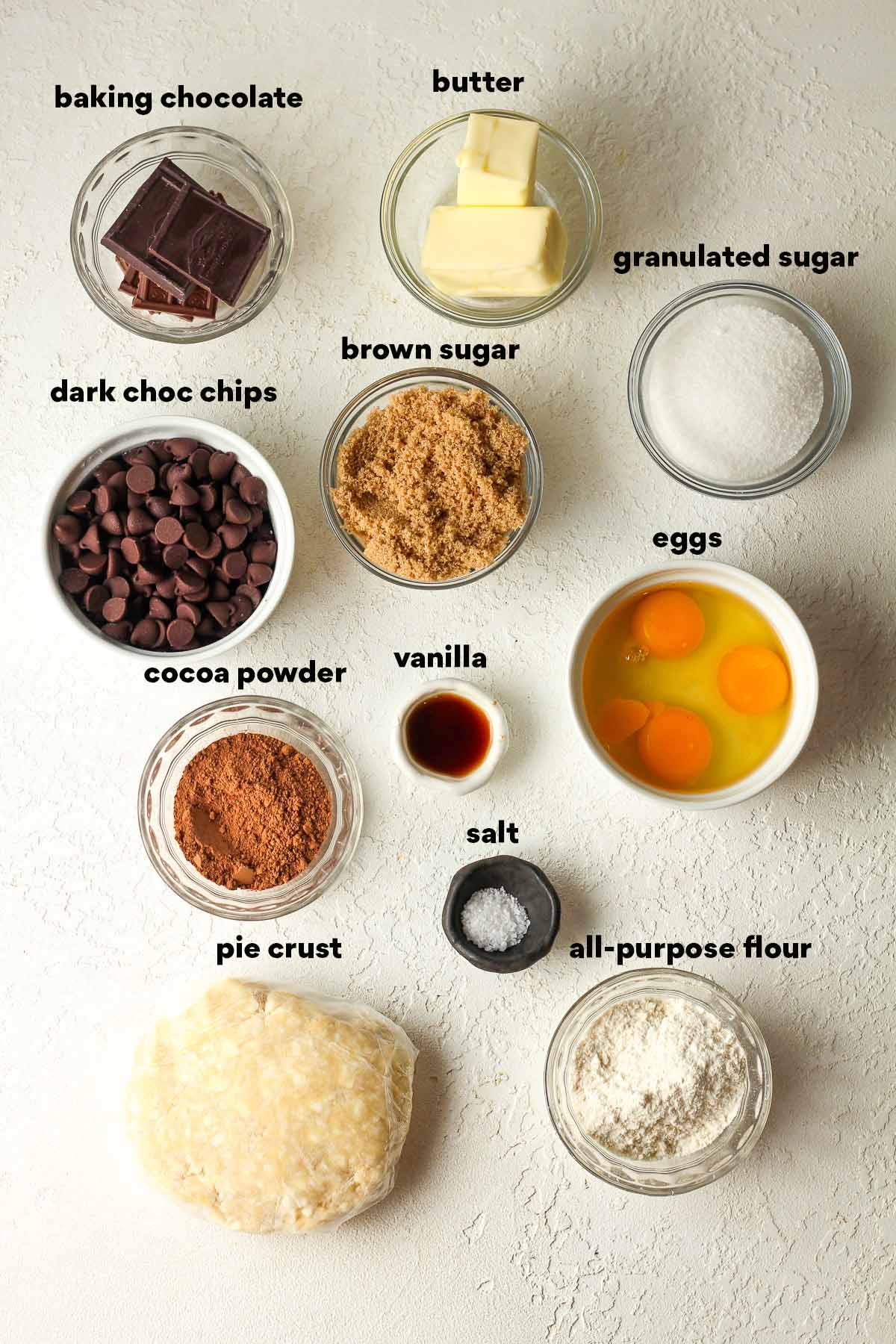 Labeled ingredients for triple chocolate brownie pie.