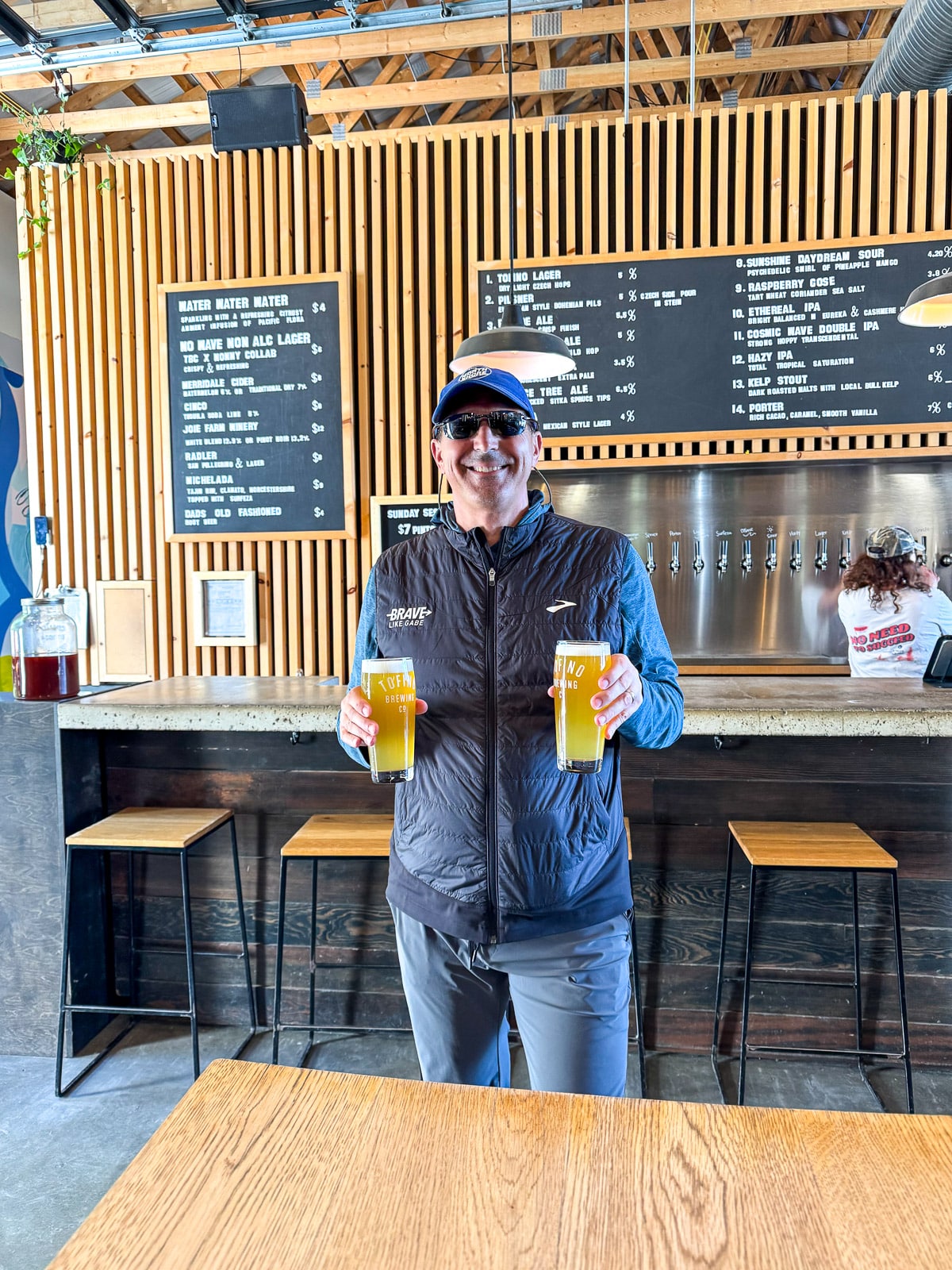 Mike bring us beers at the brewery.