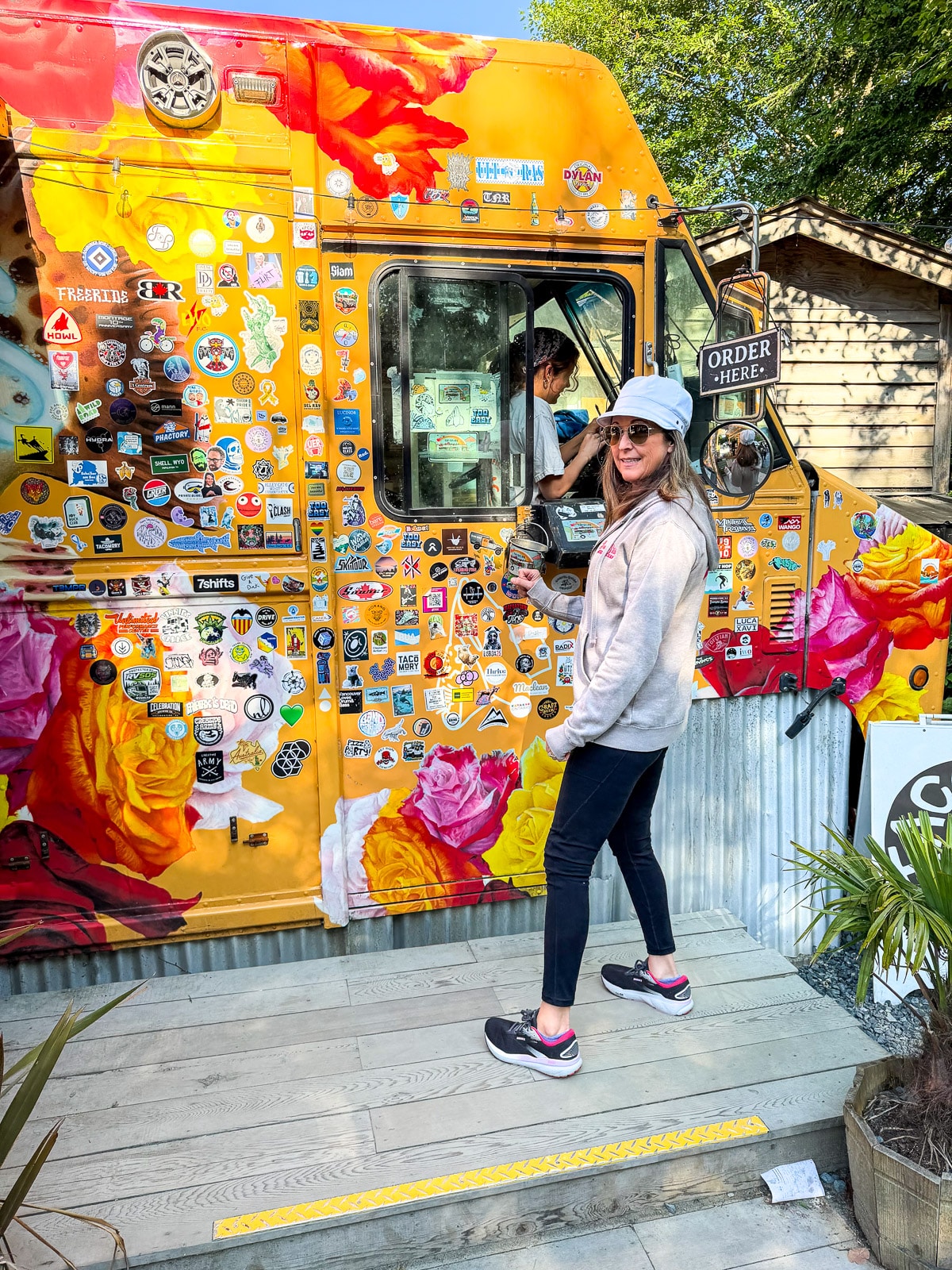 Sue in front of the Tacofino food truck.