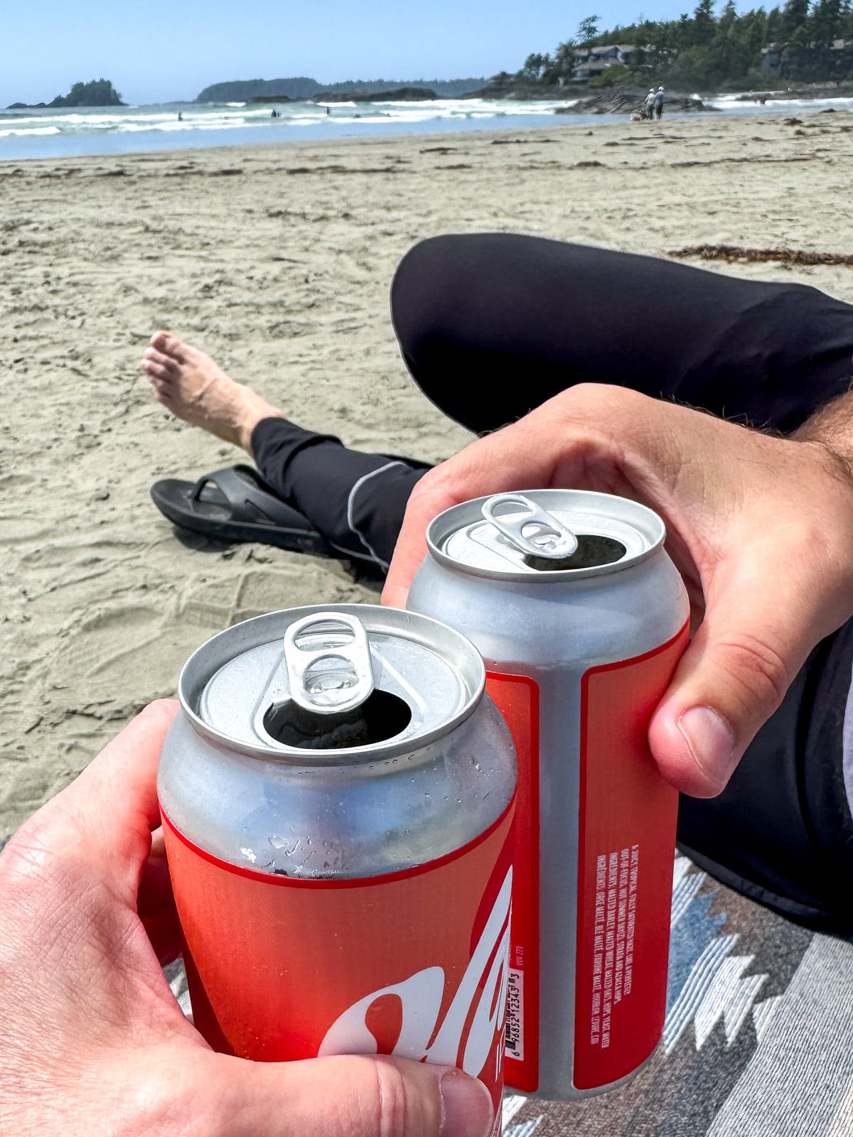 Us drinking beers on the beach one day.