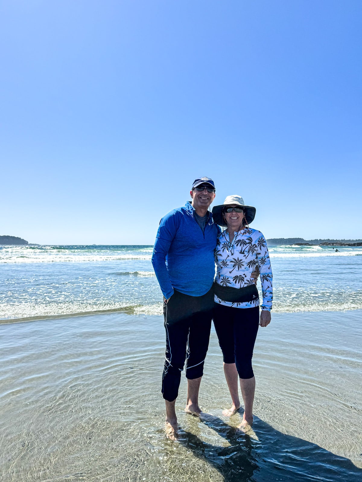 Sue and Mike on the beach with our toes in the sand.