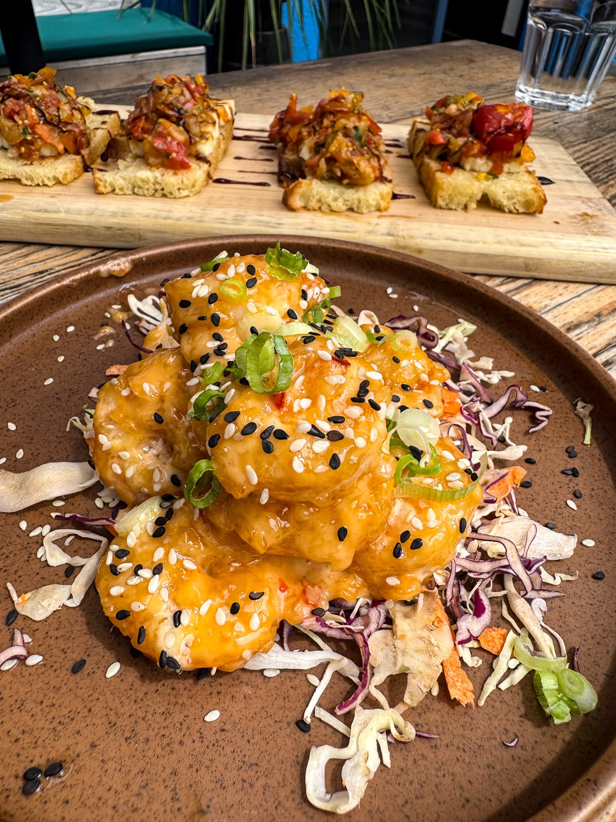 The shrimp and bruschetta apps at a brewery in Gastown.
