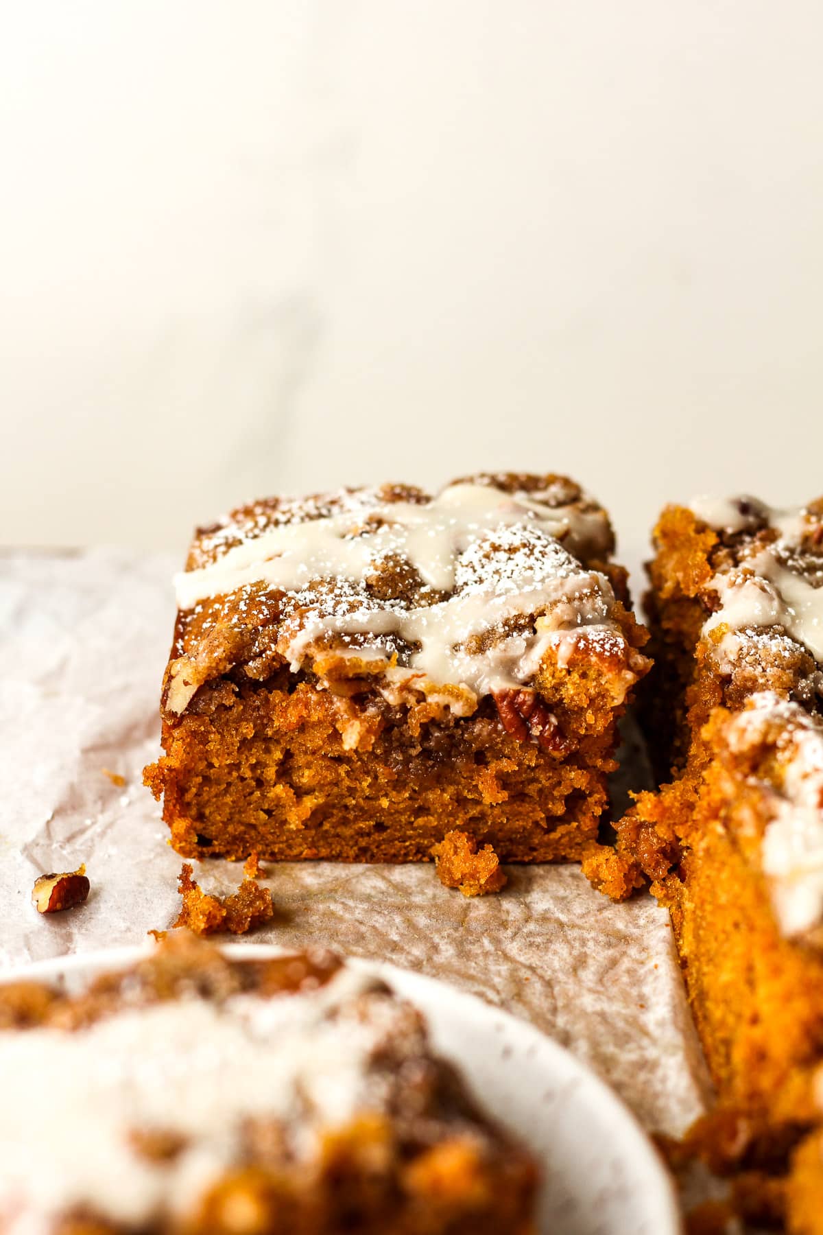 Side view of a slice of the pumpkin cake.