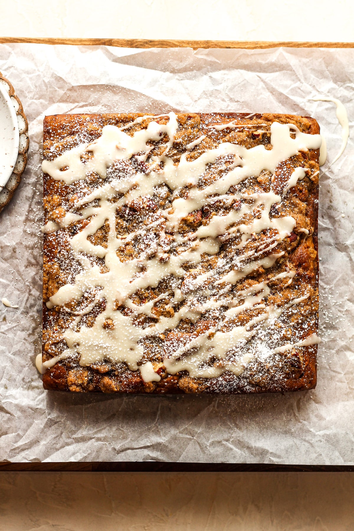 A 9x9 pumpkin coffee cake with a simple icing on top.