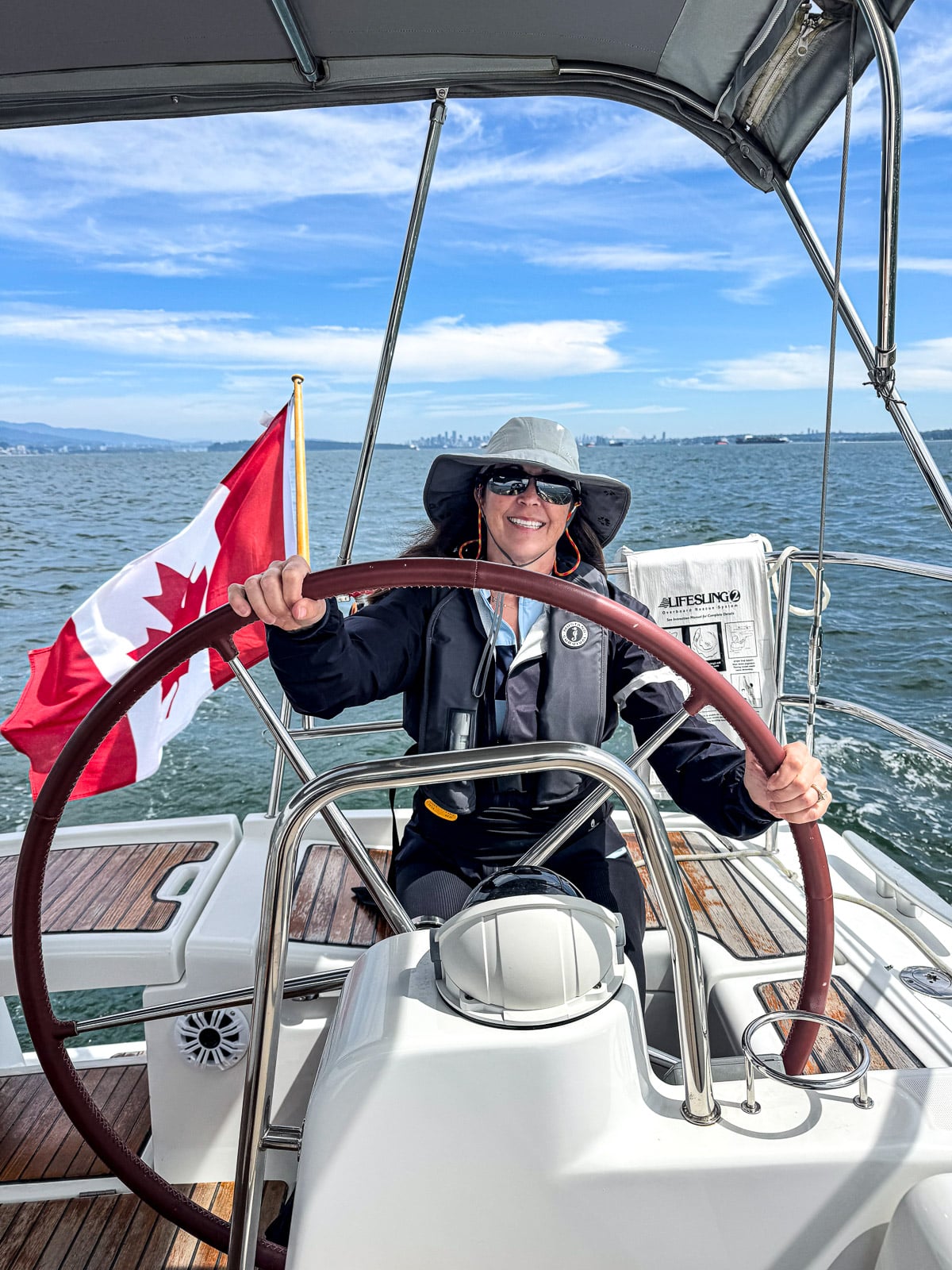 Sue driving the sailboat.