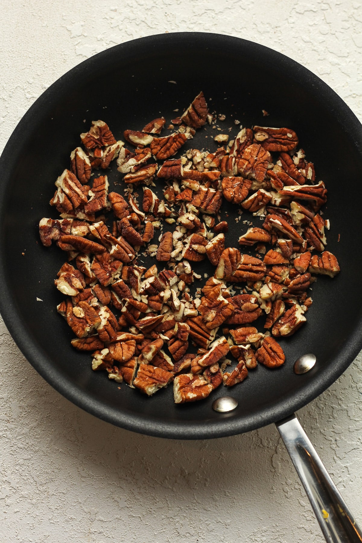 A pan of toasted pecans.