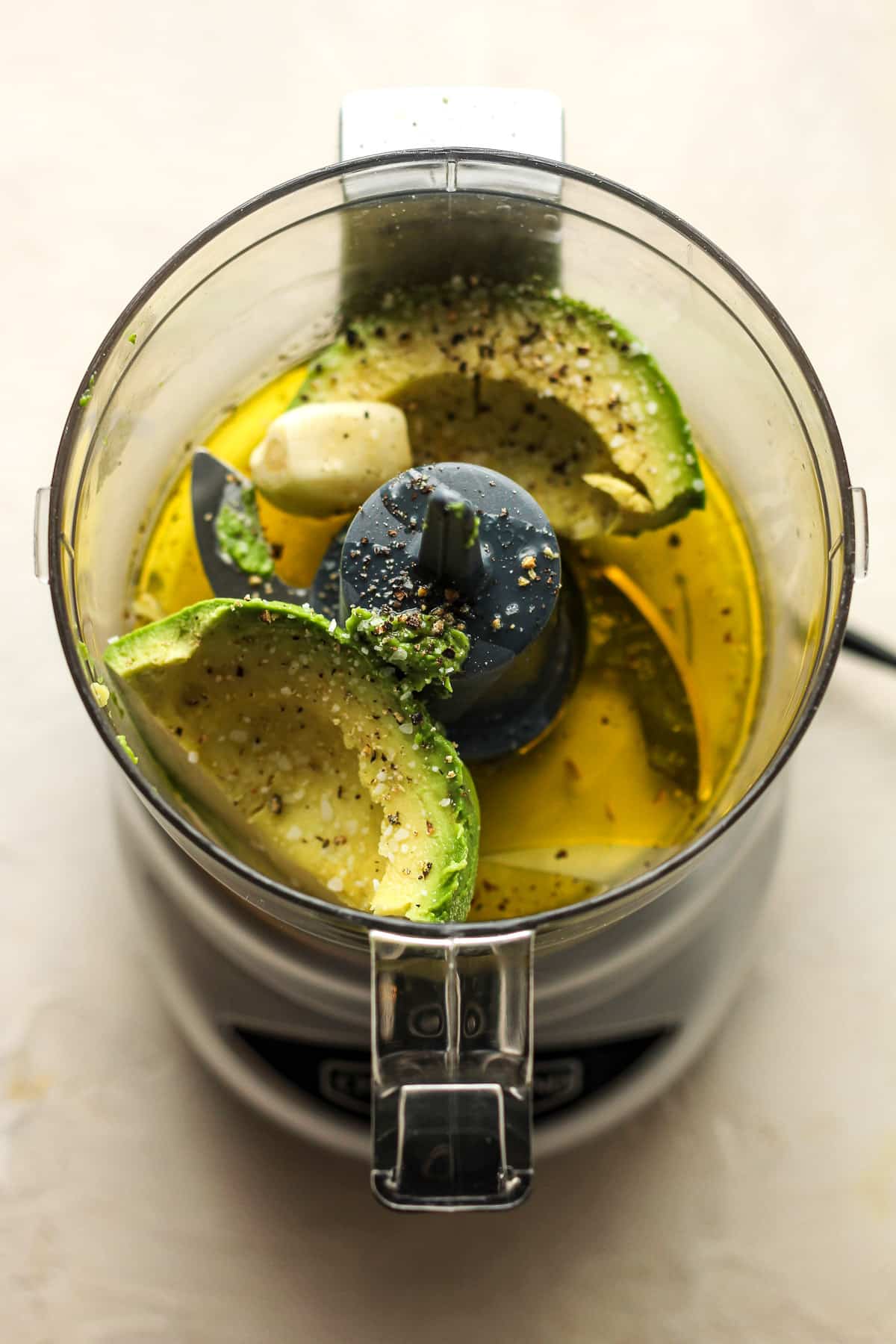 A mini food processor of the ingredients for the dressing