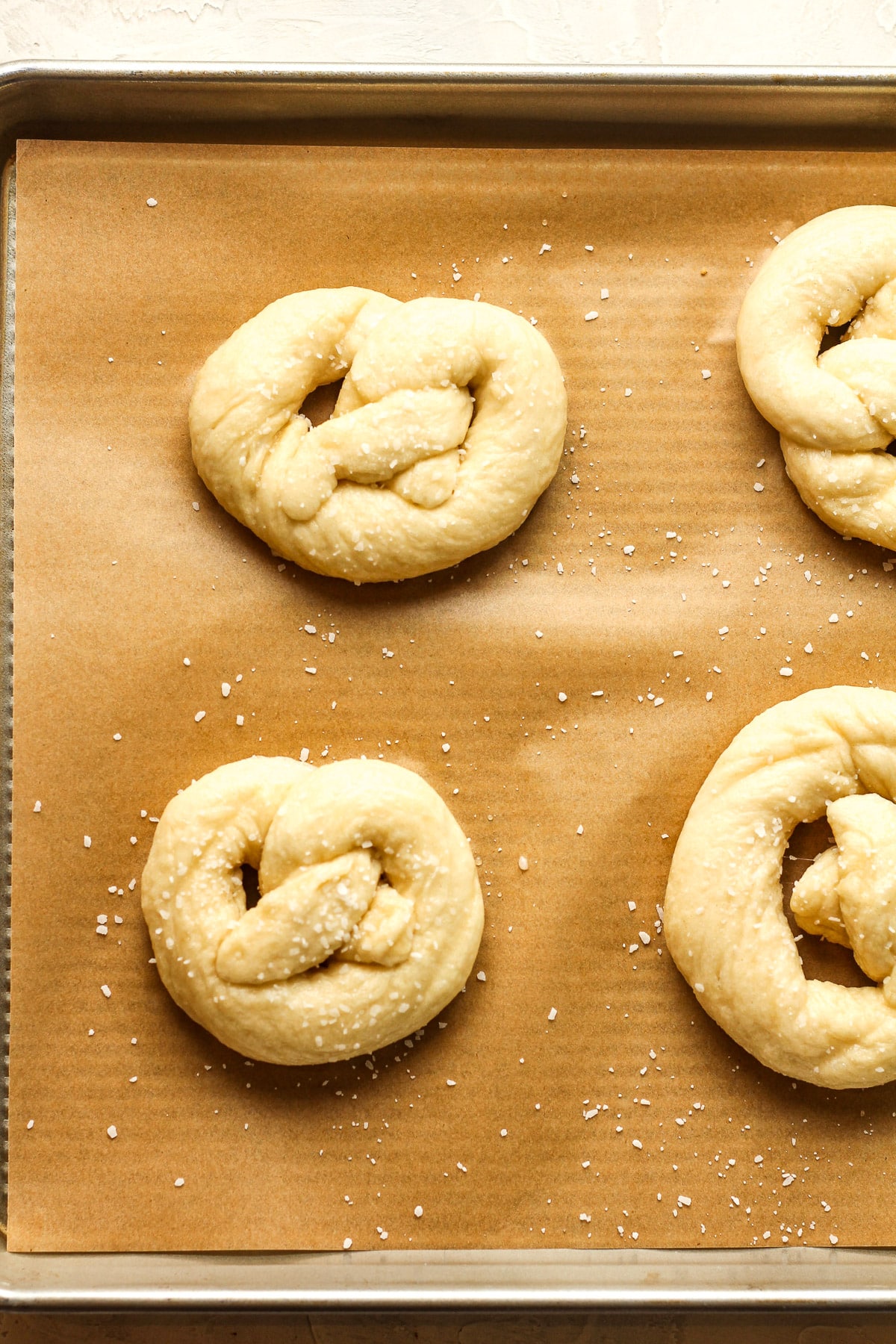 The formed pretzels after the baking soda bath.