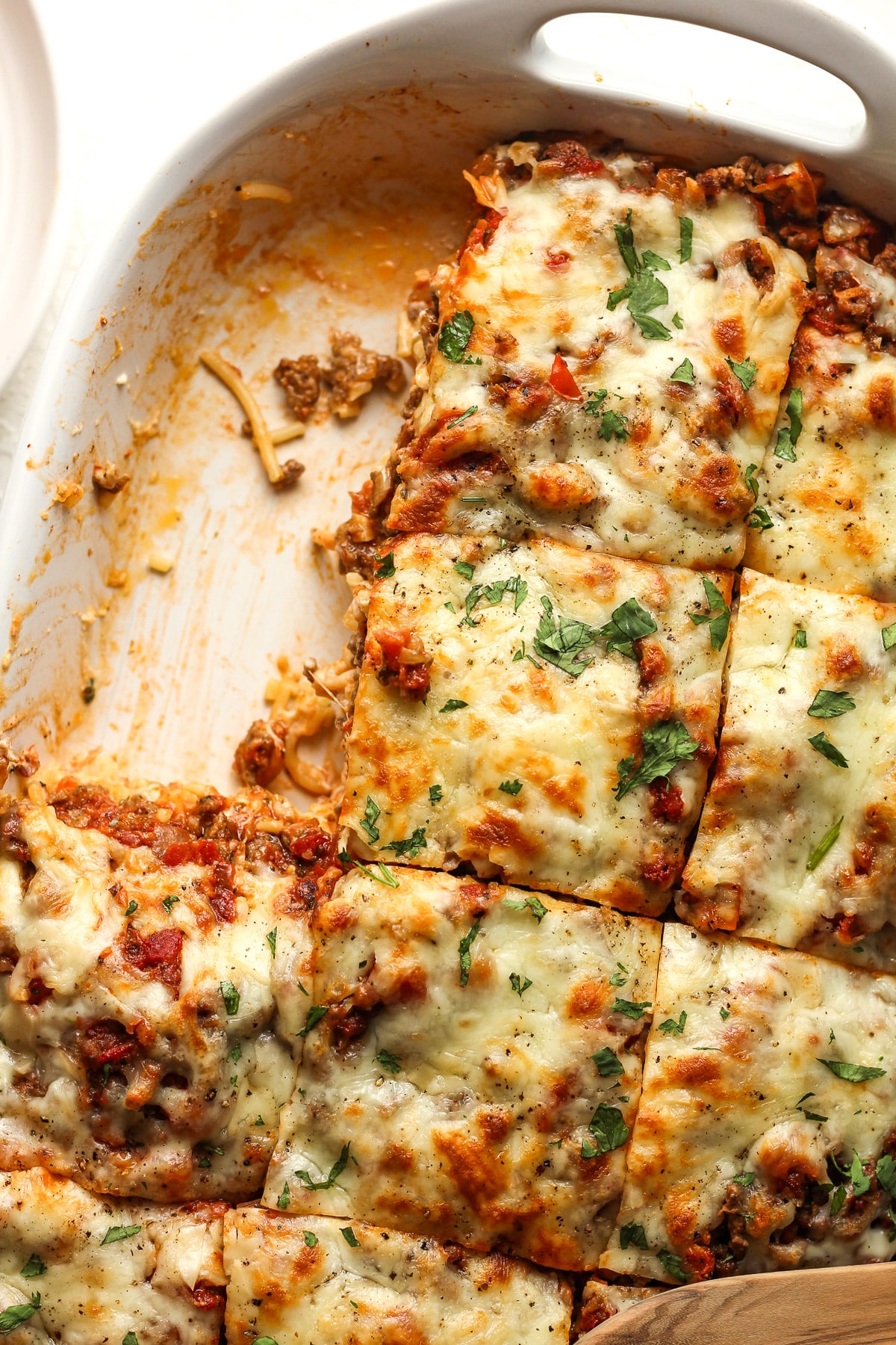 Overhead view of the casserole sliced in 12 squares.